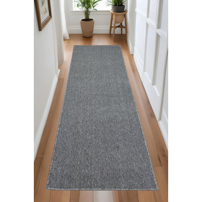 Tapis gris antidérapant sur mesure à profil bas