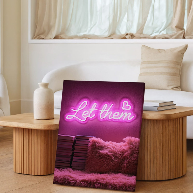 Toile, un néon rose vif rayonnant doucement contre un art mural texturé avec la phrase «Let Them In A Playful Cursive», art mural