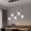 Luminaire suspendu linéaire à 5 lumières pour îlot de cuisine avec globes de cristal Hurleigh