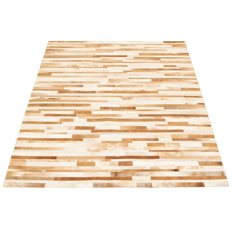 Avnee Cowhide Abstract Indoor Rug