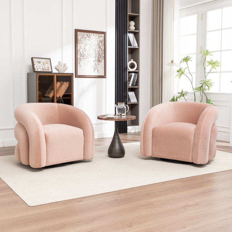 Fauteuil demi-tonneau pivotant rembourré Coyle, Rose