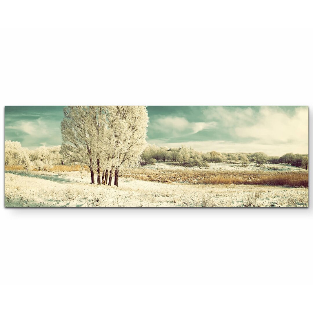 Leinwandbild Eisige Winterlandschaft mit Baum