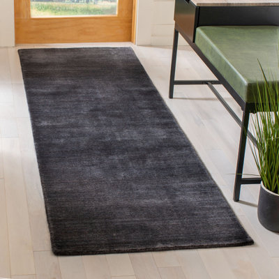 Addisyn Hand Tufted Wool/Cotton Solid Color Rug in Black