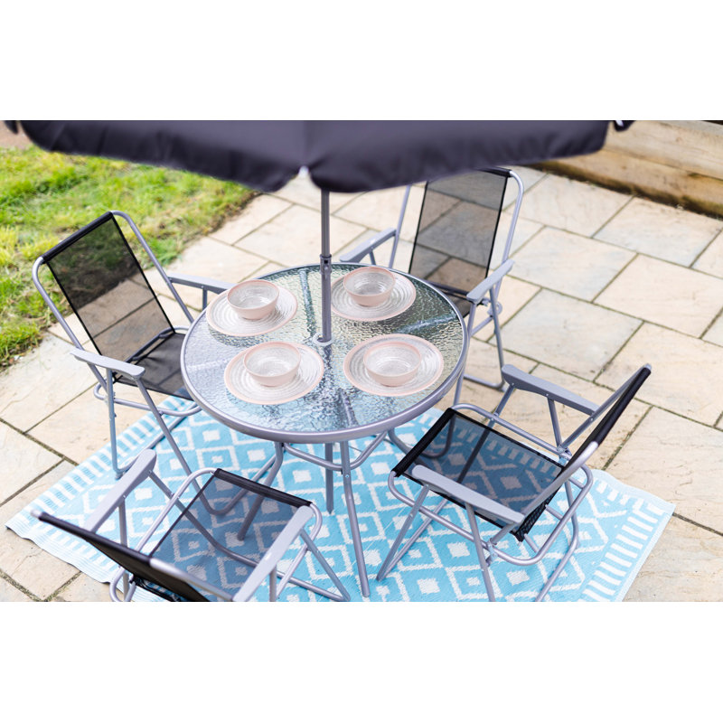 Fillian 4 - Person Patio Dining Set with Round Table
