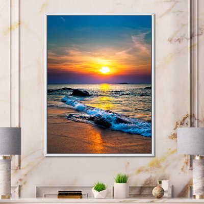 " Bright Sunset Of Waves Breaking At The Shore " by Designart
