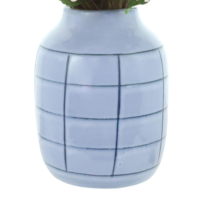 Violets Arranged in Ceramic Vase