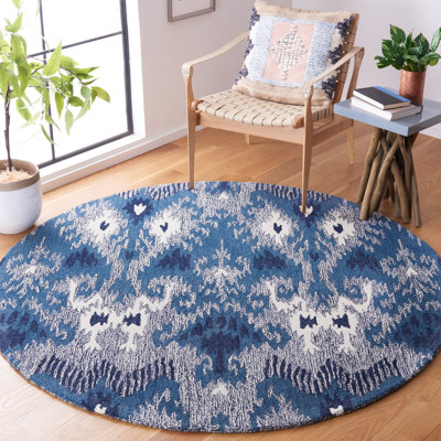 Tapis bleu / ivoire en laine / coton touffeté à la main Ikat