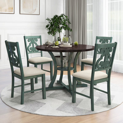 Ensemble 5 pièces de table de salle à manger et de chaises rondes avec des pieds de forme spéciale et un dossier creux de conception exquise pour la salle à manger