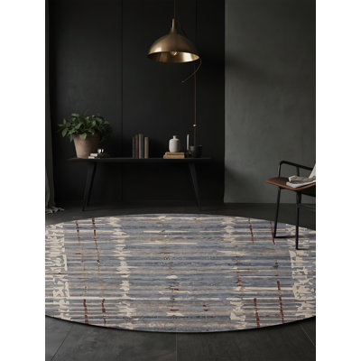 Tapis gris soyeux et moelleux
