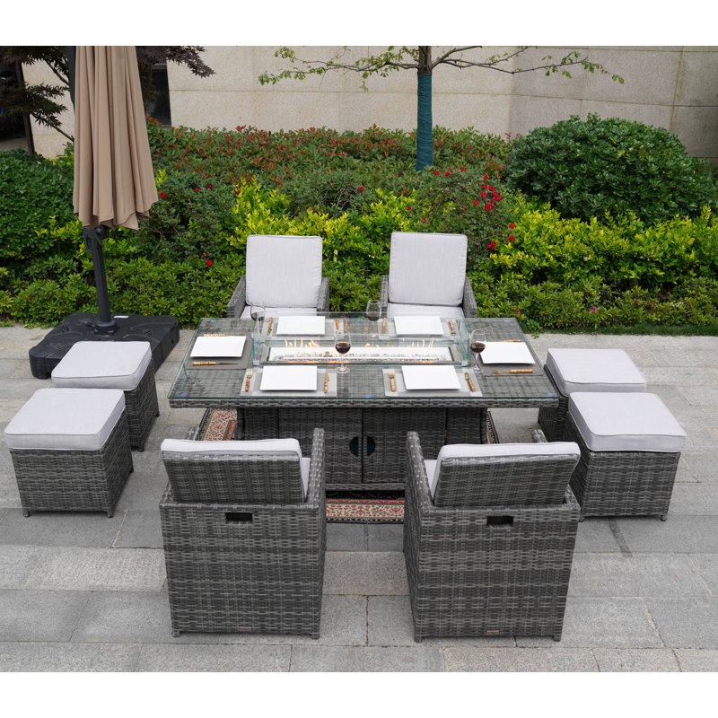 Aerolyn 8 - Person Wicker Patio Dining Set with Rectangular Table , Cushions Included