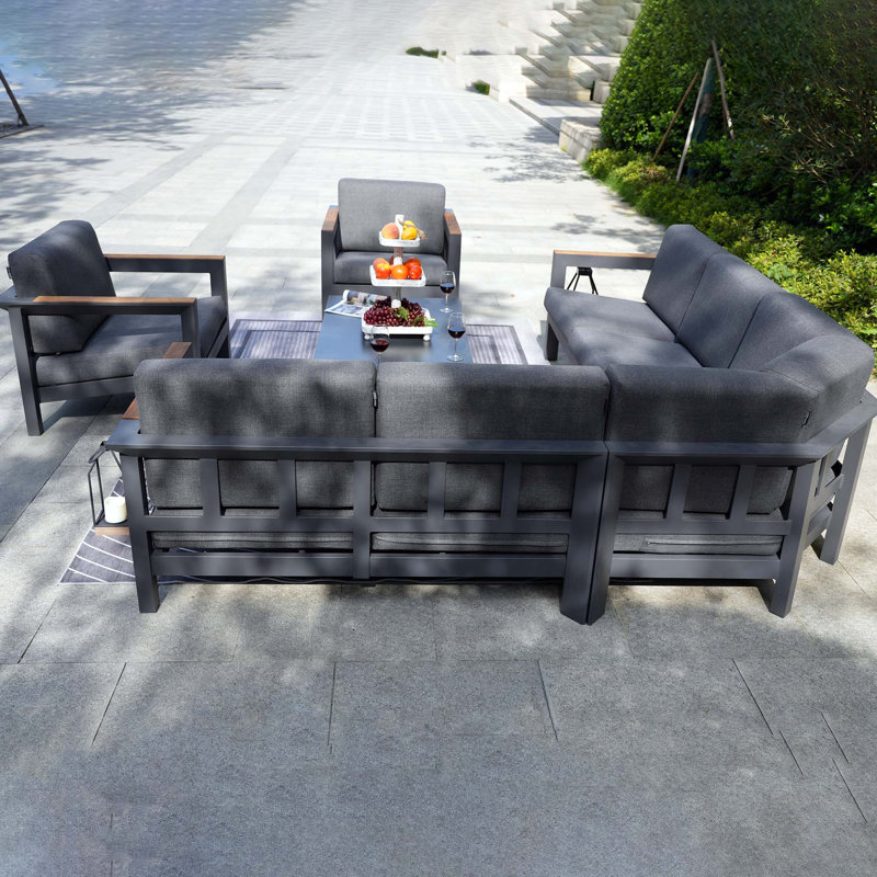 Caggiano 7 Piece Sectional Seating Group with Cushions