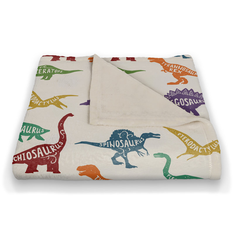 Jeté polaire à motif de dinosaure