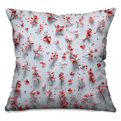 Coussin rose à motif floral