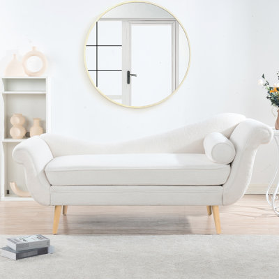 Chaise longue bleue avec coussin ergonomique, confort maigre, mousse haute, fabrication en bois massif, pieds en bouleau, forme traîneau classique, siège rembourré de mousse, cadre intérieur en contreplaqué, pieds fuselés pour le soutien