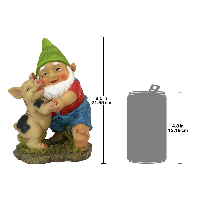 Statue de gnome heureux comme un cochon en pente