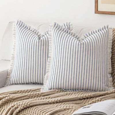 Housse de coussin bohème rayée 45 x 45 cm avec pompons