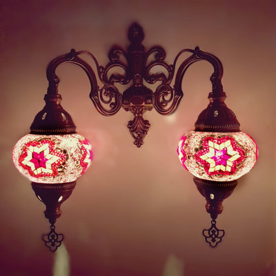 Bonanno Armed Sconce