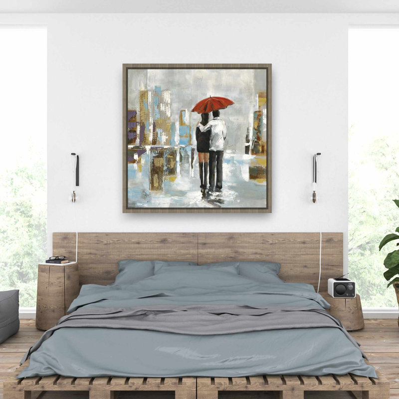 Couple marchant sous un parapluie - femme, toile encadrée bleue