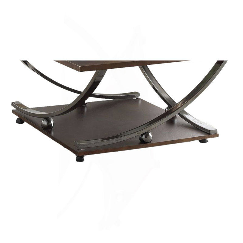 Table basse en verre transparent et finition en nickel noir