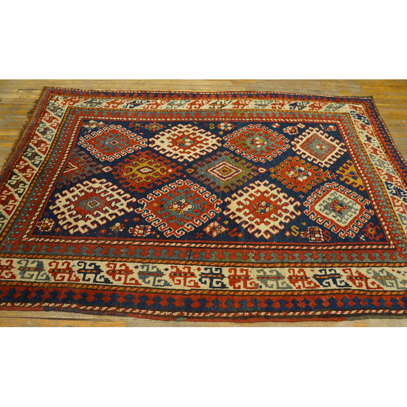 Tapis kazak antique à motif géométrique bleu