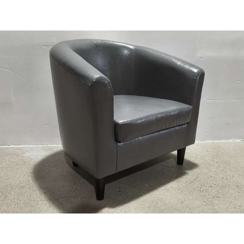 Fauteuil demi-tonneau luxueux en similicuir avec repose-pieds
