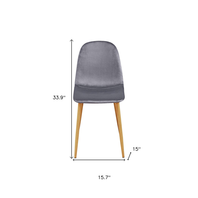 Ensemble de quatre chaises d'appoint en velours gris et chêne et acier