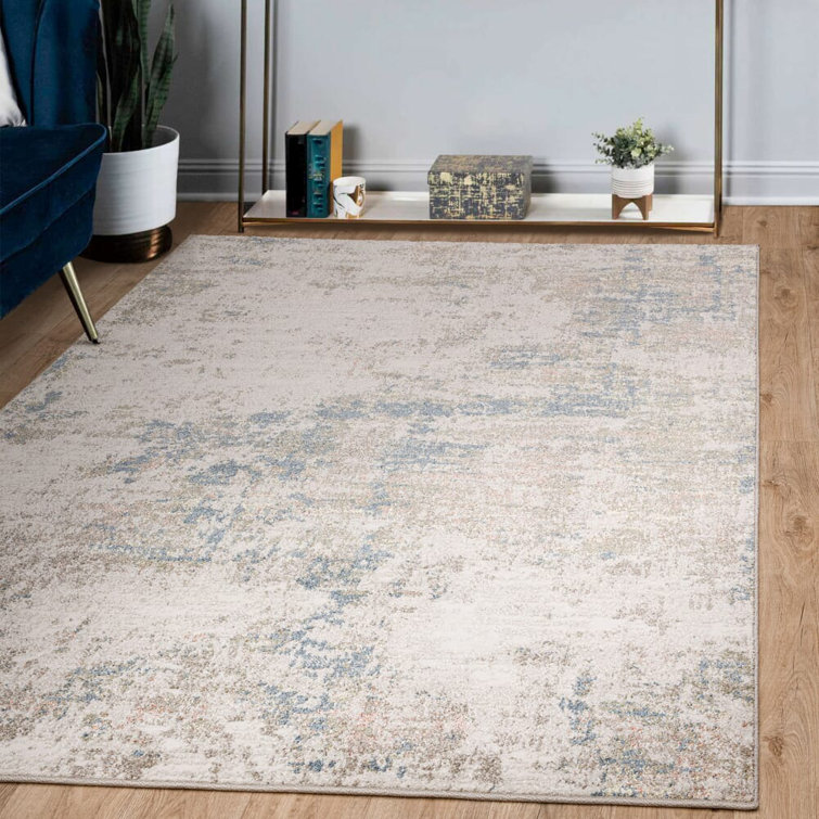 Delanor Abstract Ivory/Blue Area Rug