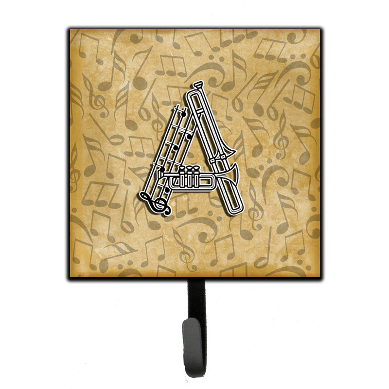 Porte-garde-bûche et crochet mural musical instrument, A