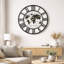 Horloge murale en métal Damauri