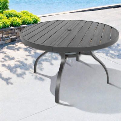 Table de patio ronde moderne, structure en métal avec plateau en faux bois, salle à manger d'extérieur