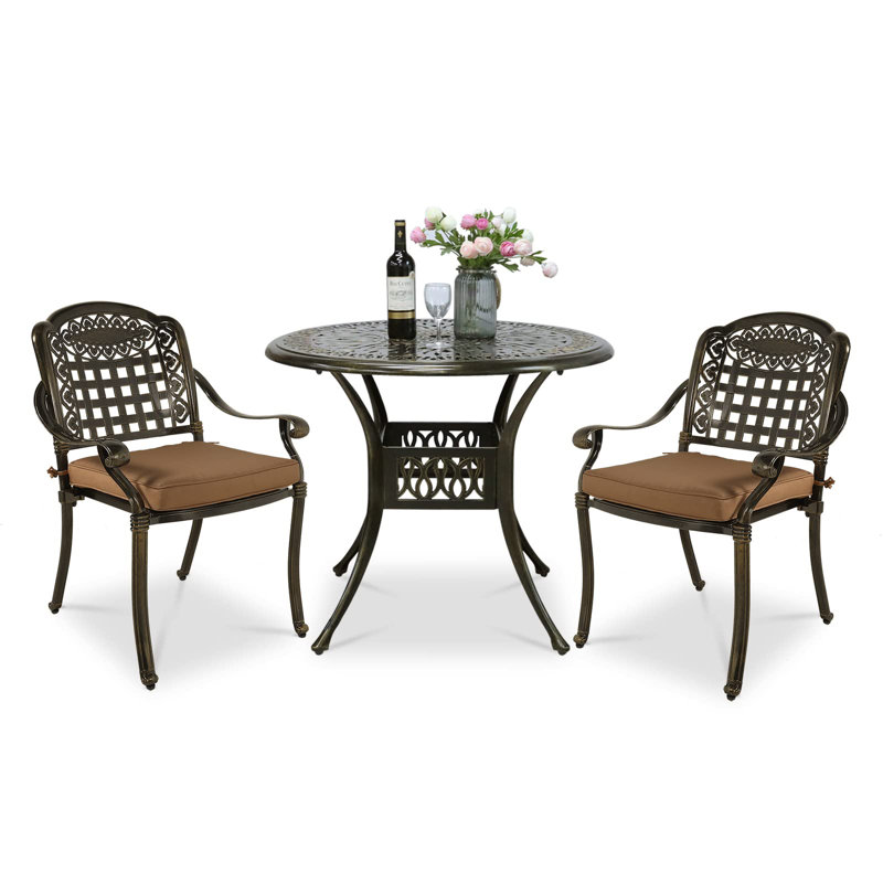 Anieta 2 - Person Patio Dining Set with Round Table , Cushions Included