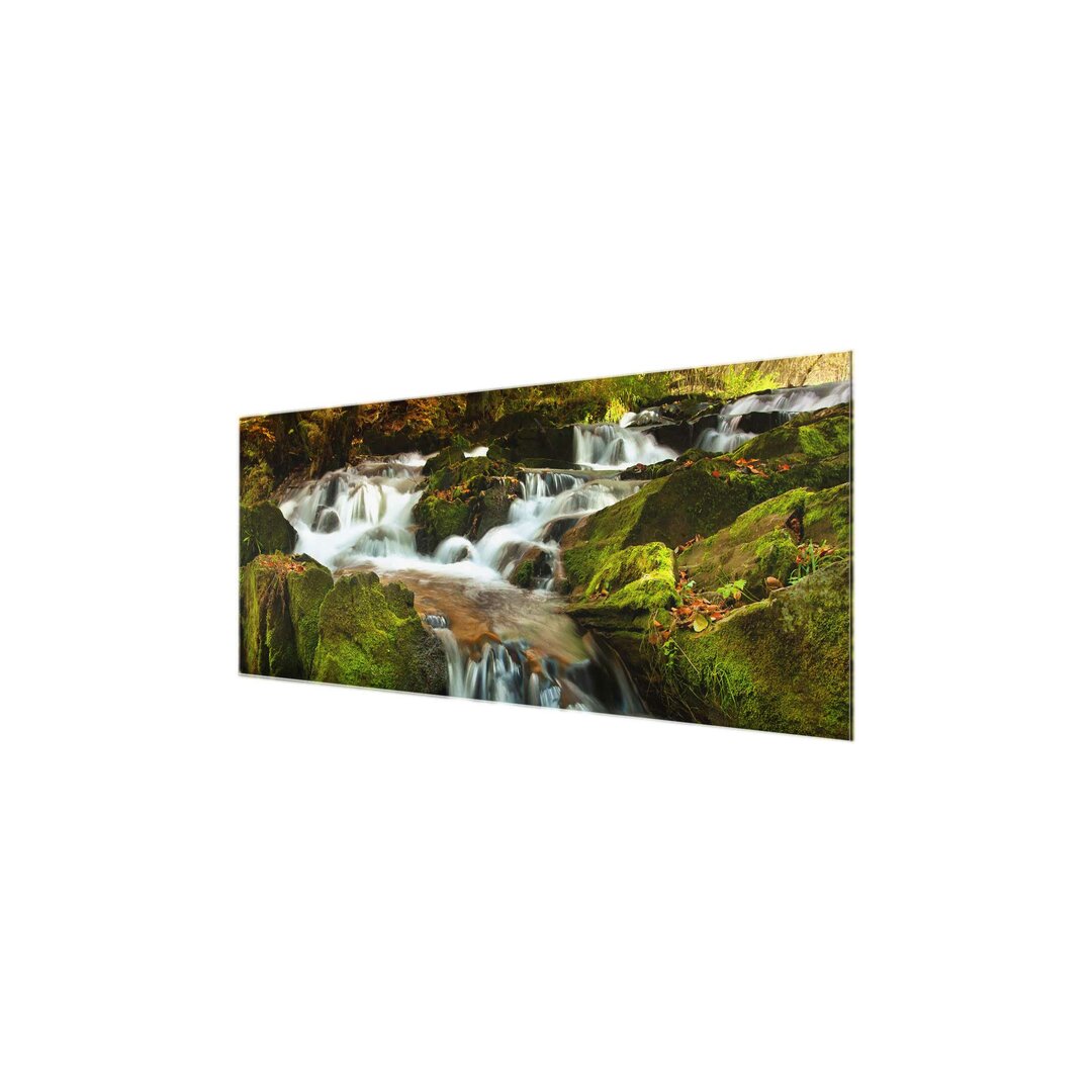 Glasbild Waterfall In An Autumn Forest