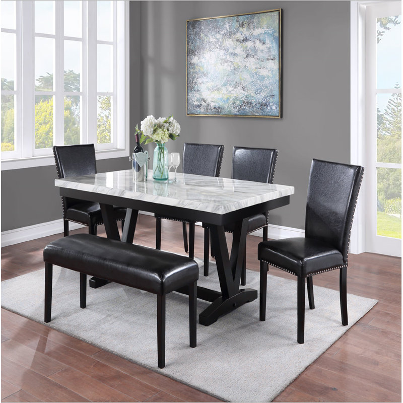 Ensemble de table de salle à manger blanche et noire avec chaises rembourrées noires et garniture cloutée 6 pièces