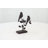 Cole And Grey Polystone Perching Bird Decorative Sculpture With Leaf Vines And Copper Shading