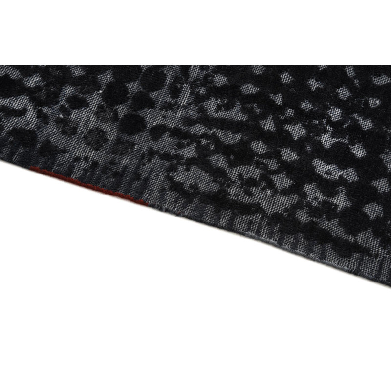 Tapis noir Iniguez