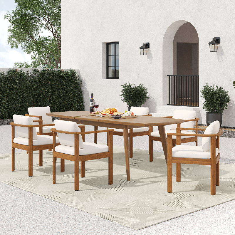 Gelbert 7-Piece Mid-Century Modern Acacia Wood Expandable Outdoor Dining Set With Curved Barrel Armchairs & Slatted Extension Table