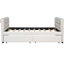 Lit de jour simple rembourré beige avec tiroirs, structure en lattes de bois stables, rangement confortable, structure solide, mobilier de chambre moderne