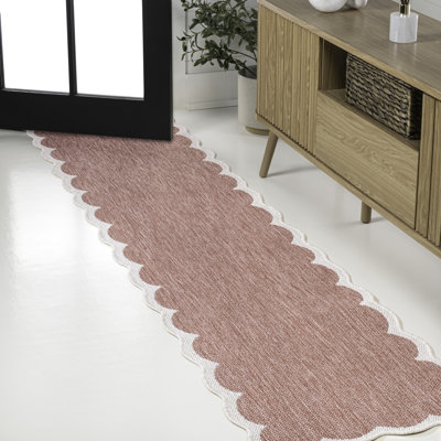 Tapis d'intérieur / extérieur festonné deux tons rose clair / crème Manado