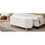 Rangement blanc moderne avec revêtement et pieds en bois pour la chambre à coucher