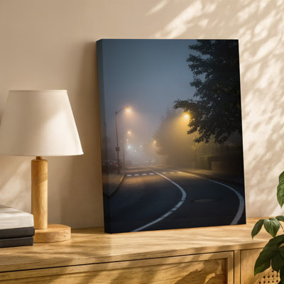 Canvas A Serene Foggy Night Scene Featuring A Dimly Lit Street Wall Art Illuminated By Soft Golden Streetlights That Pierce Through A Canvas Wall Art
