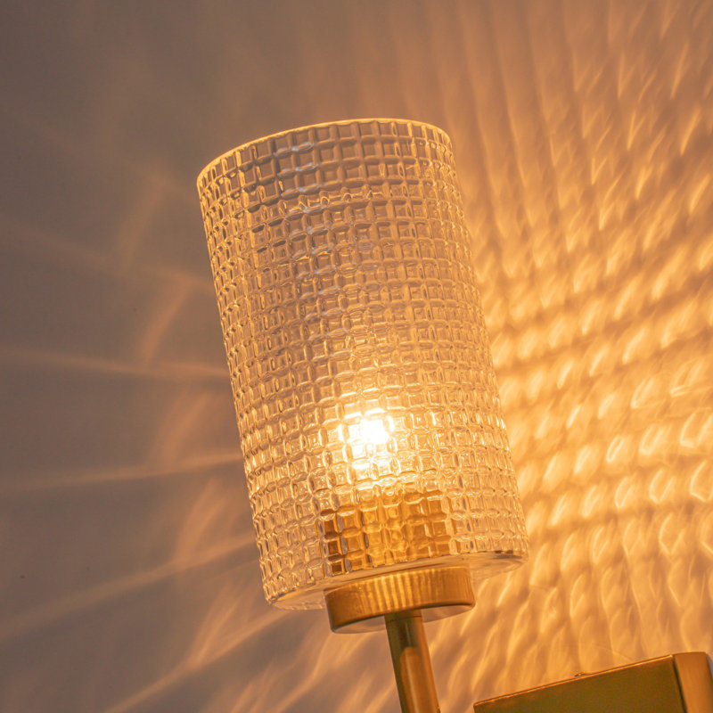 Dimmable Armed Sconce with Prismatic Glass Shade