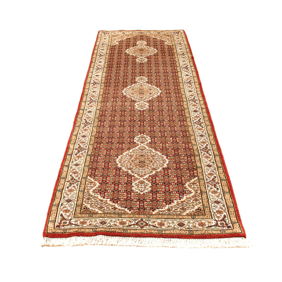 Handgefertigter Teppich Allijah aus Wolle in Rot/Beige/Grün