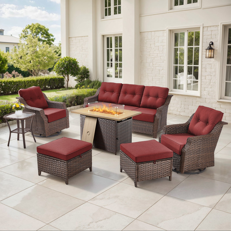 Sami 7-Piece Wicker Patio Furniture Set With Fire Pit Table, 6-Inch Thick Cushioned 360° Swivel Glider Chairs & Ottomans, Red