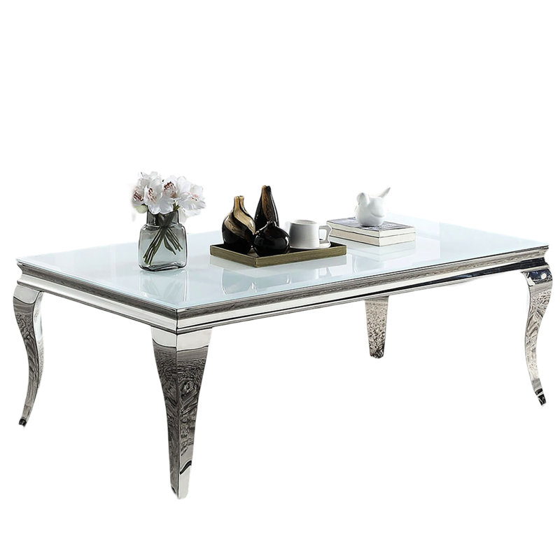 Table basse contemporaine avec plateau en verre biseauté blanc et pieds en acier inoxydable argenté de style trempé, élégance moderne
