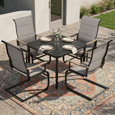 5-Piece Outdoor Dining Set With Padded Textilene C-Spring Motion Chairs