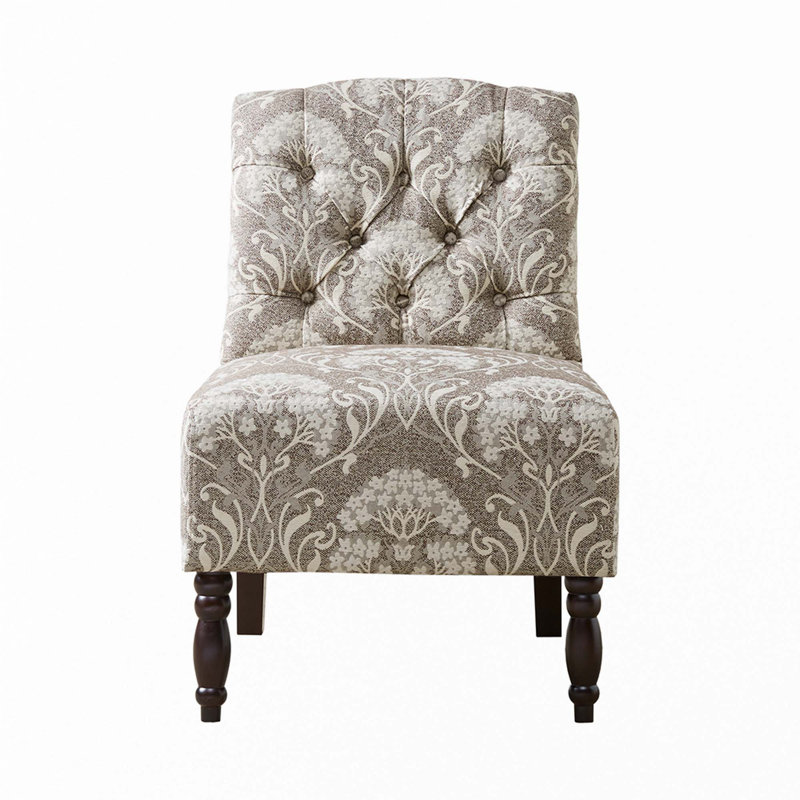 Fauteuil capitonné sans accoudoirs