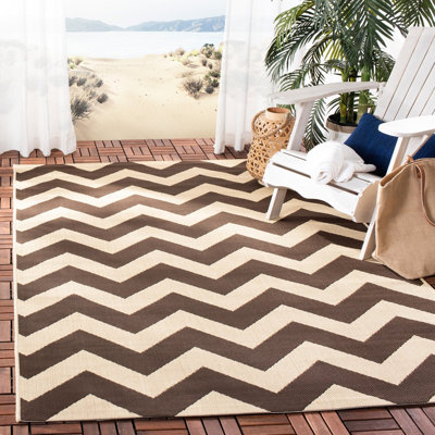 Tapis intérieur / extérieur brun foncé Arneshia