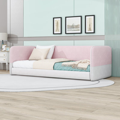 Lit simple tapissier sur pied avec accoudoirs