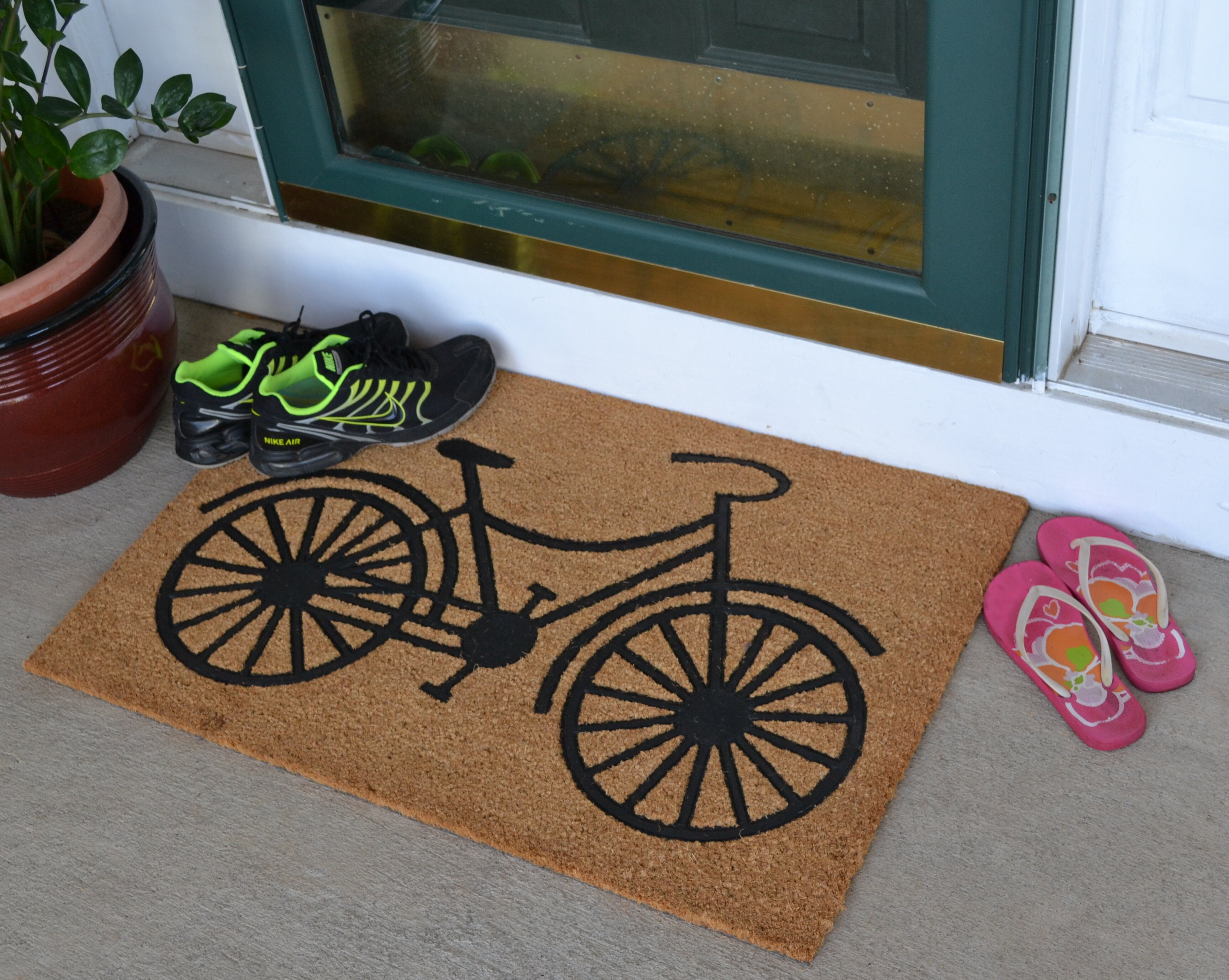 https://assets.wfcdn.com/im/57020202/compr-r85/1014/101423537/kimberley-non-slip-outdoor-doormat.jpg