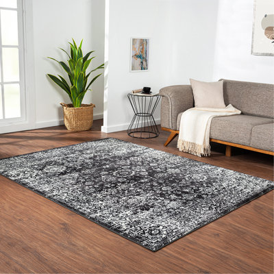 Tapis persan tissé délavé rétro